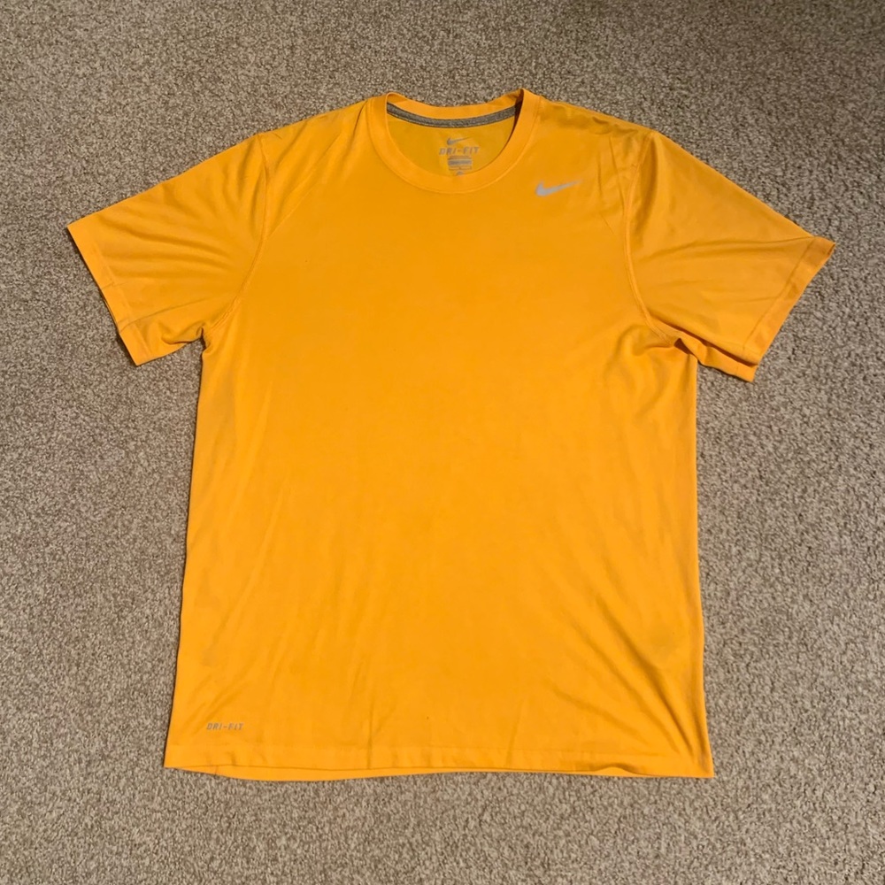 Orange Nike athletic men’s shirt